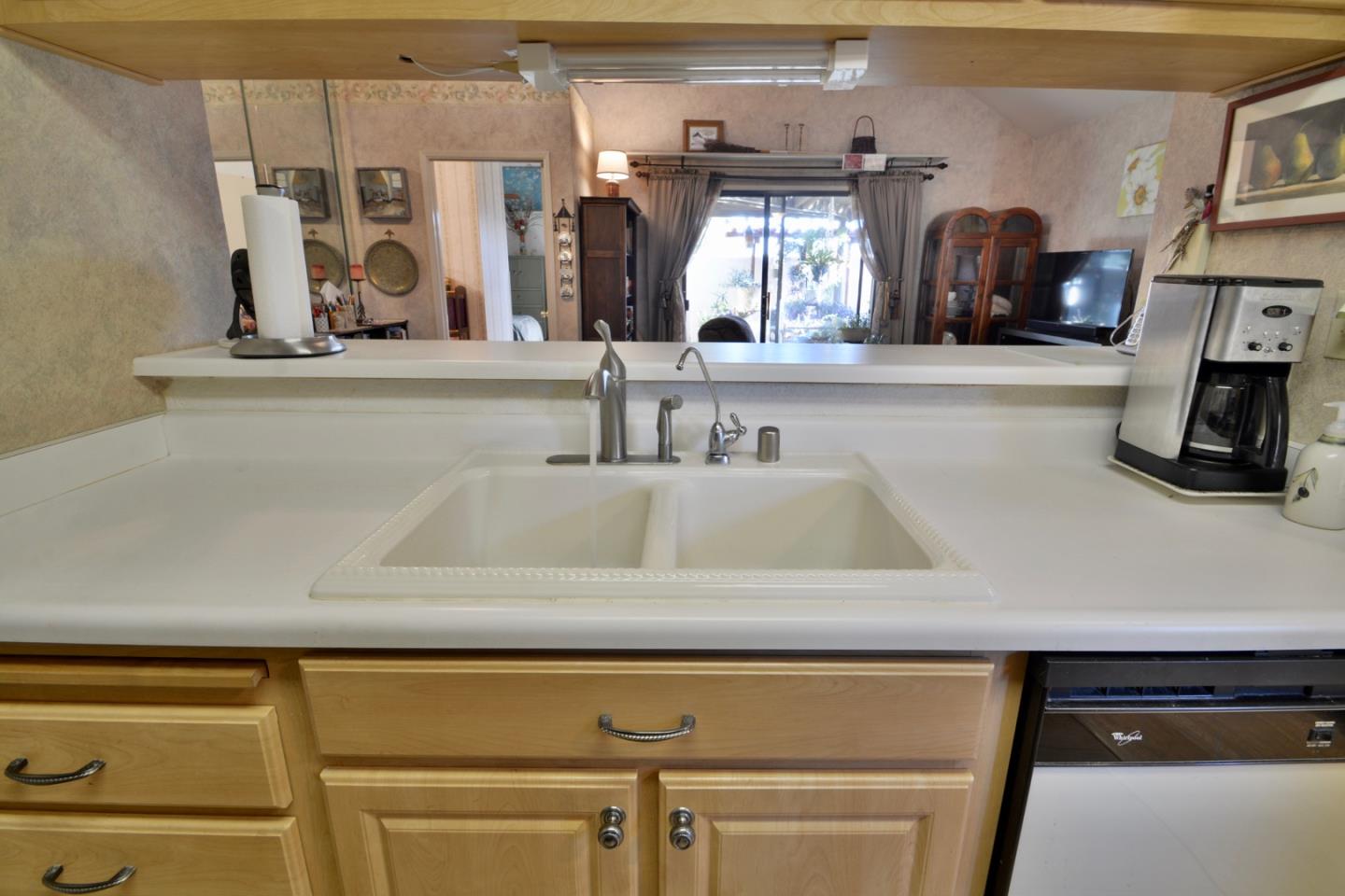 738 Natalie Drive Morgan Hill, CA 95037 - Photo 9 of 37 a view of a kitchen with furniture and storage