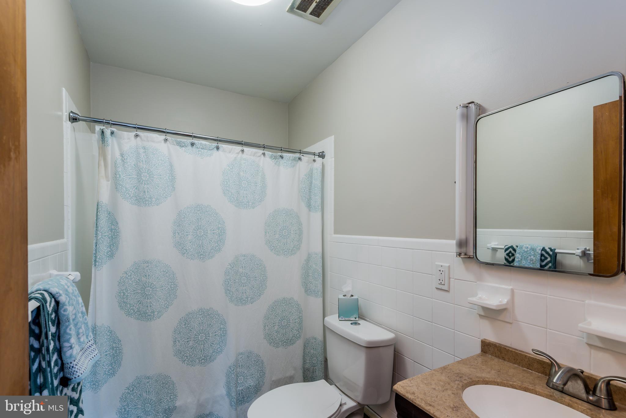 3518 Trindle Road, Unit 1 Camp Hill, PA 17011 - Photo 8 of 14 a bathroom with a sink toilet and shower