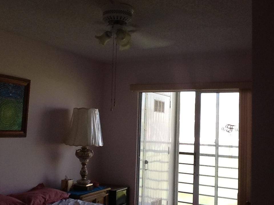 28 Mansfield B Boca Raton, FL 33434 - Photo 14 of 26 2nd bedroom leading to enclosed porch!