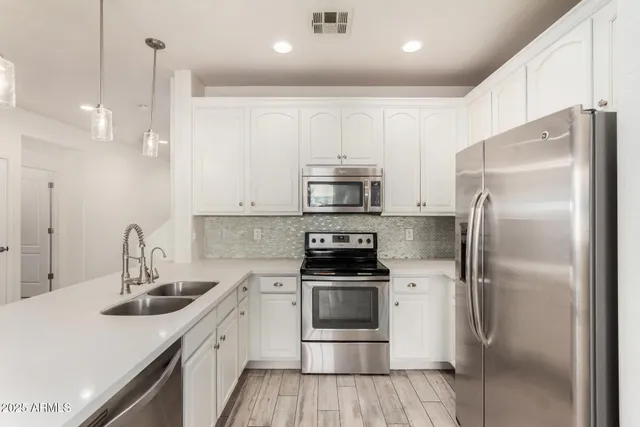 a view of yard from a corridor