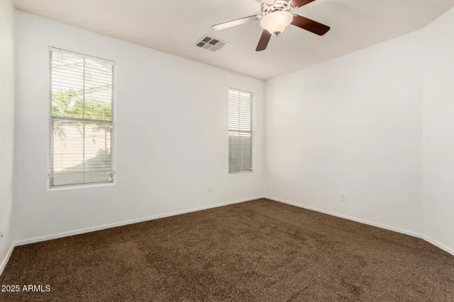 a view of a front door and a outdoor space