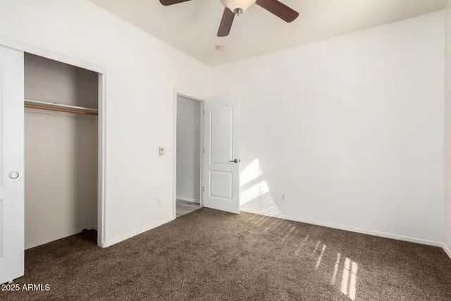 a kitchen with kitchen island a sink stainless steel appliances and cabinets