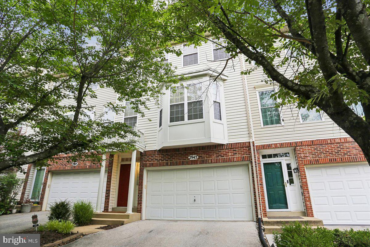 2943 St Helen Circle Silver Spring, MD 20906 - Photo 1 of 40 Charming townhouse with lush greenery.