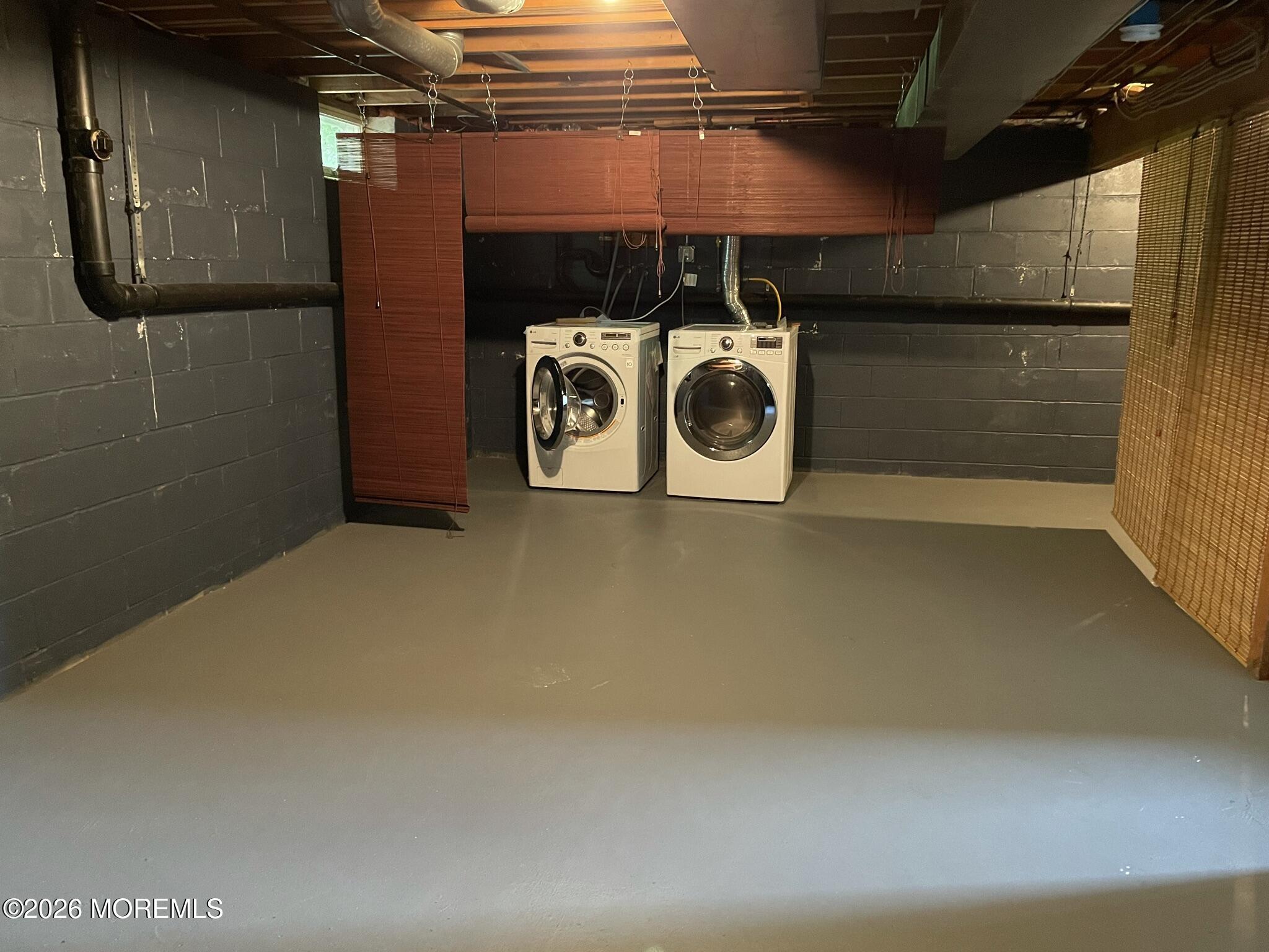 19 Clavendon Court Middletown, NJ 07748 - Photo 19 of 21 a utility room with dryer and washer