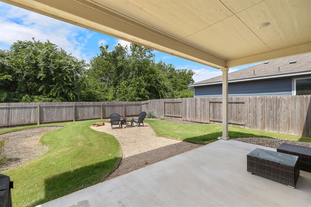 3605 Talladega Trace Austin, TX 78728 - Photo 26 of 27 a view of a backyard with wooden fence