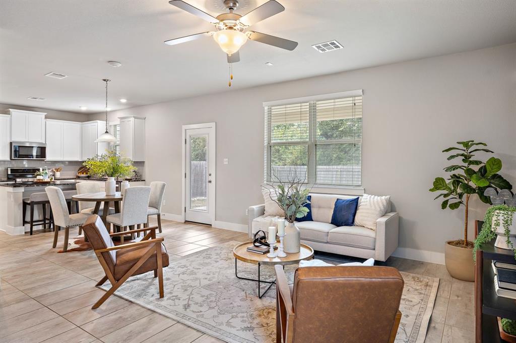 3605 Talladega Trace Austin, TX 78728 - Photo 5 of 27 a living room with furniture and a large window