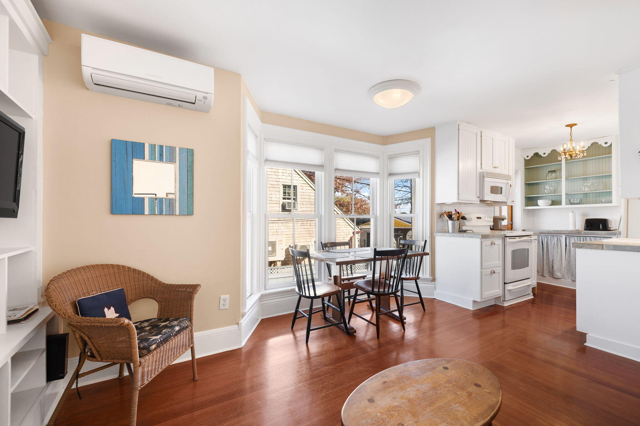 176 Commercial Street, Unit U2 Provincetown, MA 02657 - Photo 11 of 29 a dining room with furniture and wooden floor