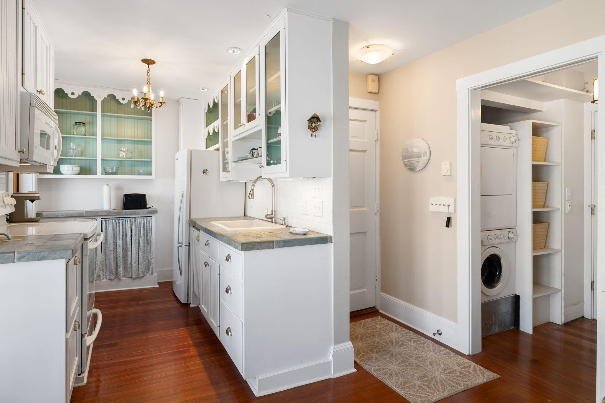 176 Commercial Street, Unit U2 Provincetown, MA 02657 - Photo 14 of 29 a spacious bathroom with a double vanity sink a mirror and shower