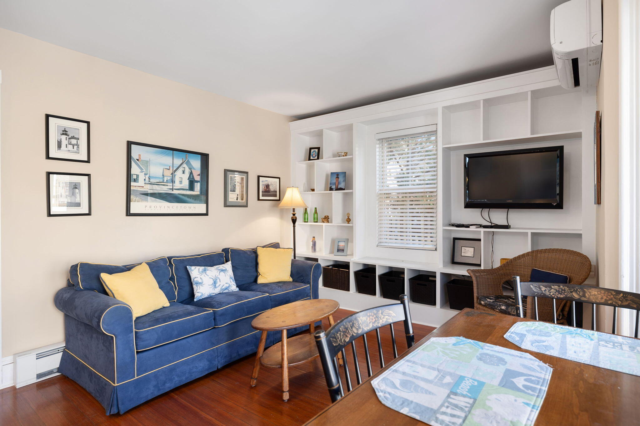 176 Commercial Street, Unit U2 Provincetown, MA 02657 - Photo 6 of 29 a living room with furniture and a flat screen tv