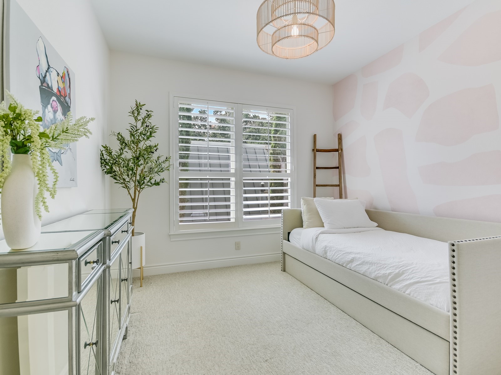 809 Kinney Avenue Austin, TX 78704 - Photo 18 of 21 a bedroom with a bed and a potted plant