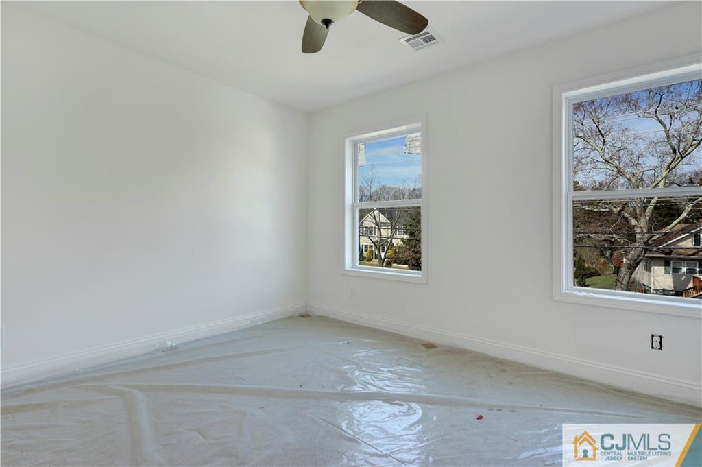 11 Addison Road Howell, NJ 07731 - Photo 21 of 25 an empty room with windows