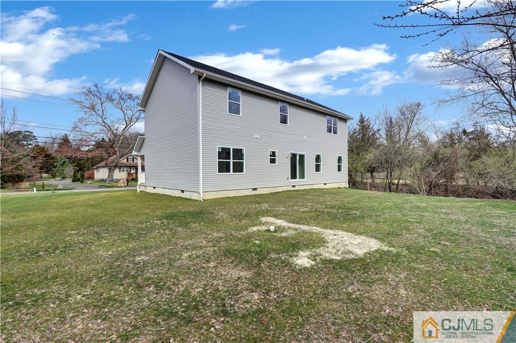 11 Addison Road Howell, NJ 07731 - Photo 24 of 25 a view of a white house with a yard