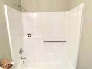 452 Lexington Drive Lawrenceville, GA 30046 - Photo 9 of 9 a bathroom with a shower and a sink