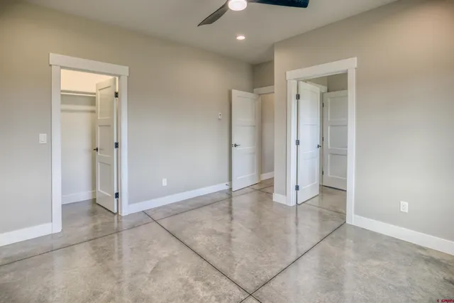 a view of a bathroom with a tub and shower