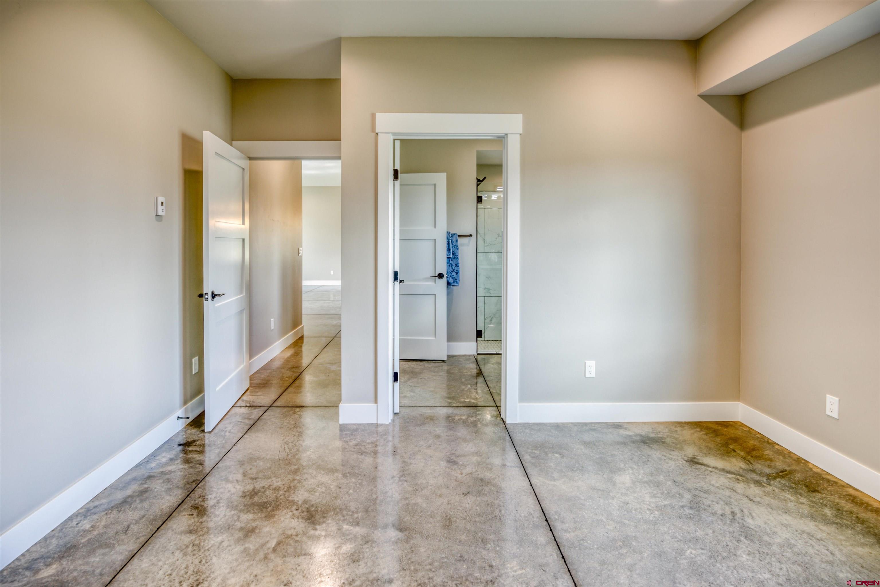 2790 Rock Road, Unit B Pagosa Springs, CO 81147 - Photo 19 of 43 a view of a bathroom with a tub and shower