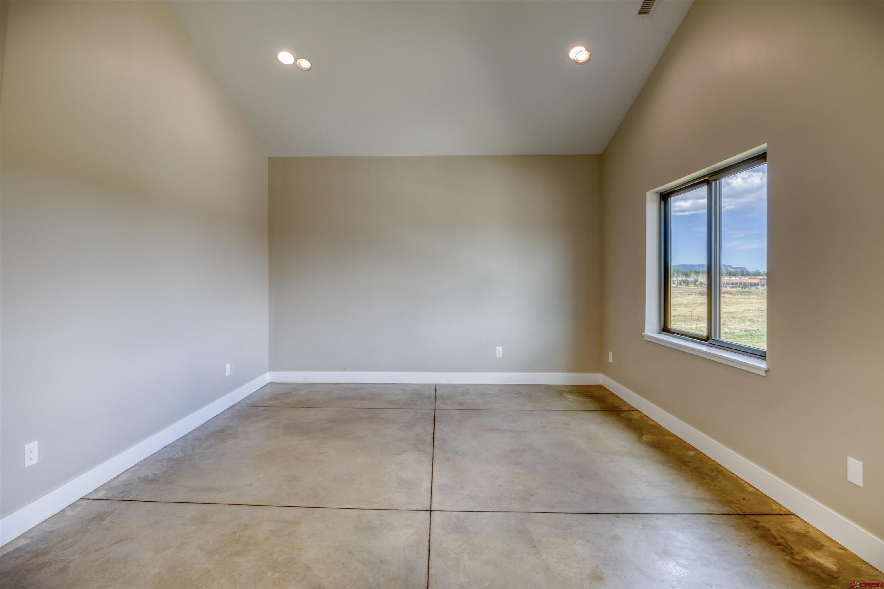 2790 Rock Road, Unit B Pagosa Springs, CO 81147 - Photo 29 of 43 an empty room with windows