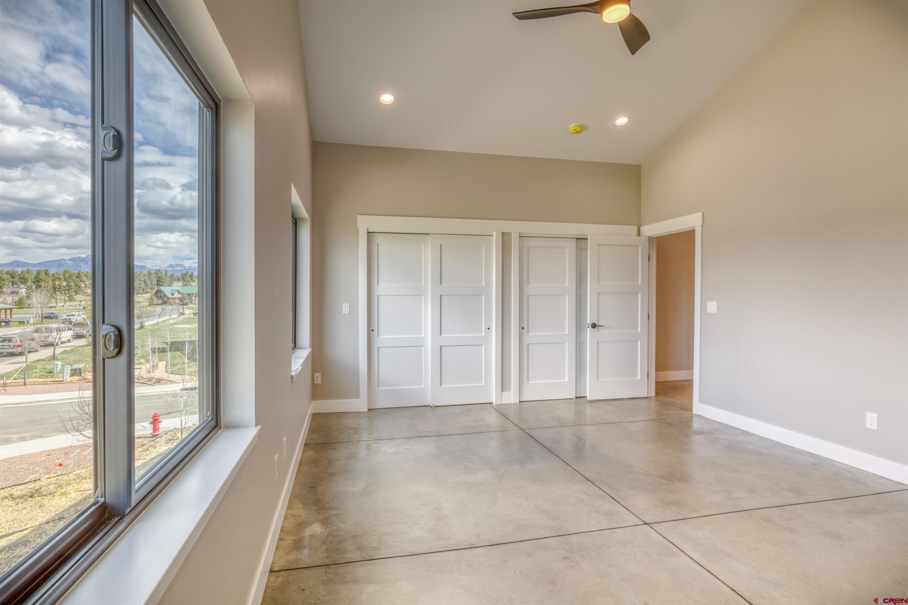 2790 Rock Road, Unit B Pagosa Springs, CO 81147 - Photo 32 of 43 a view of an empty room with glass door