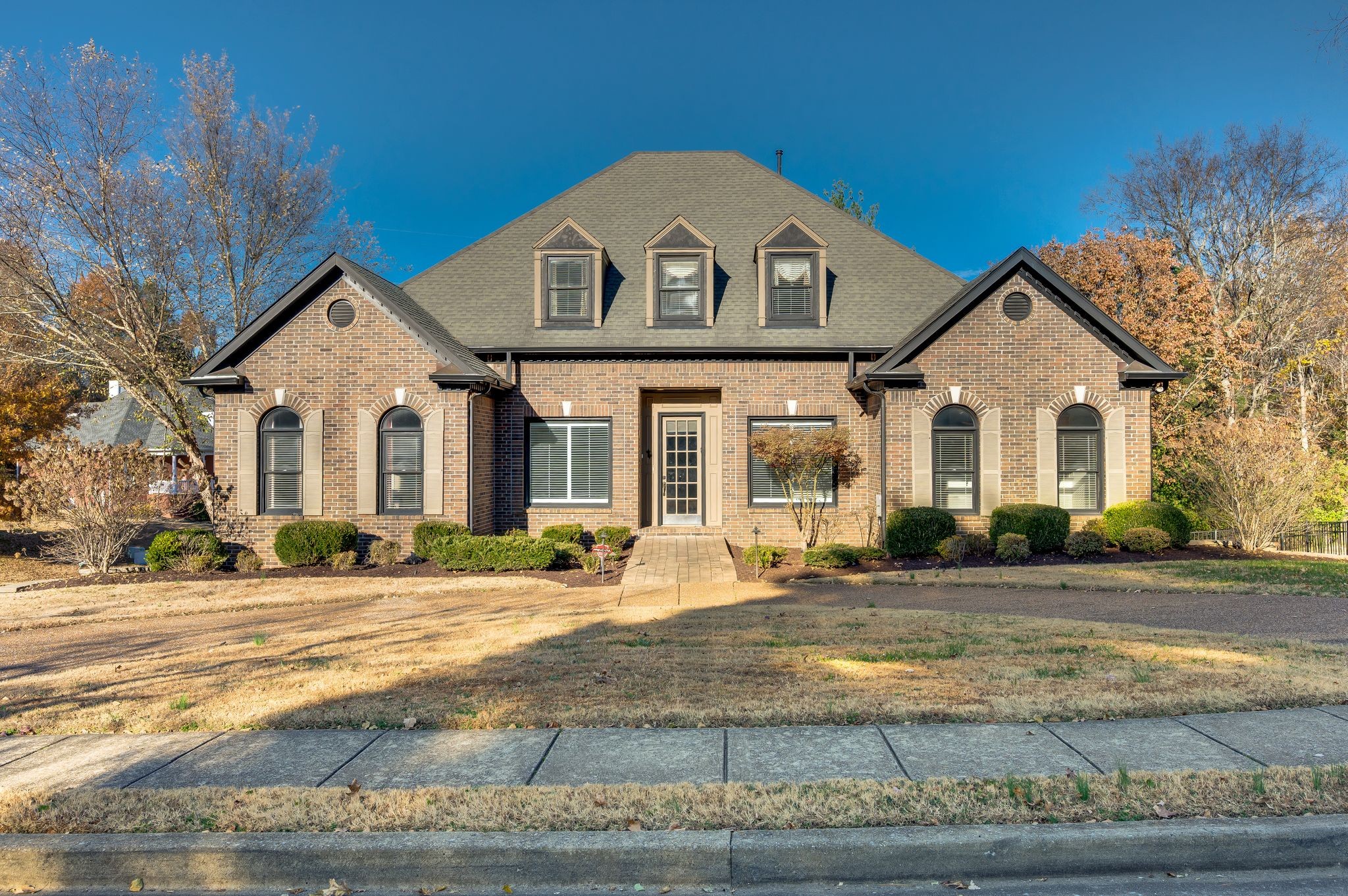 1060 Stonebridge Park Drive Franklin, TN 37069 - Photo 1 of 51 a front view of a house with a yard