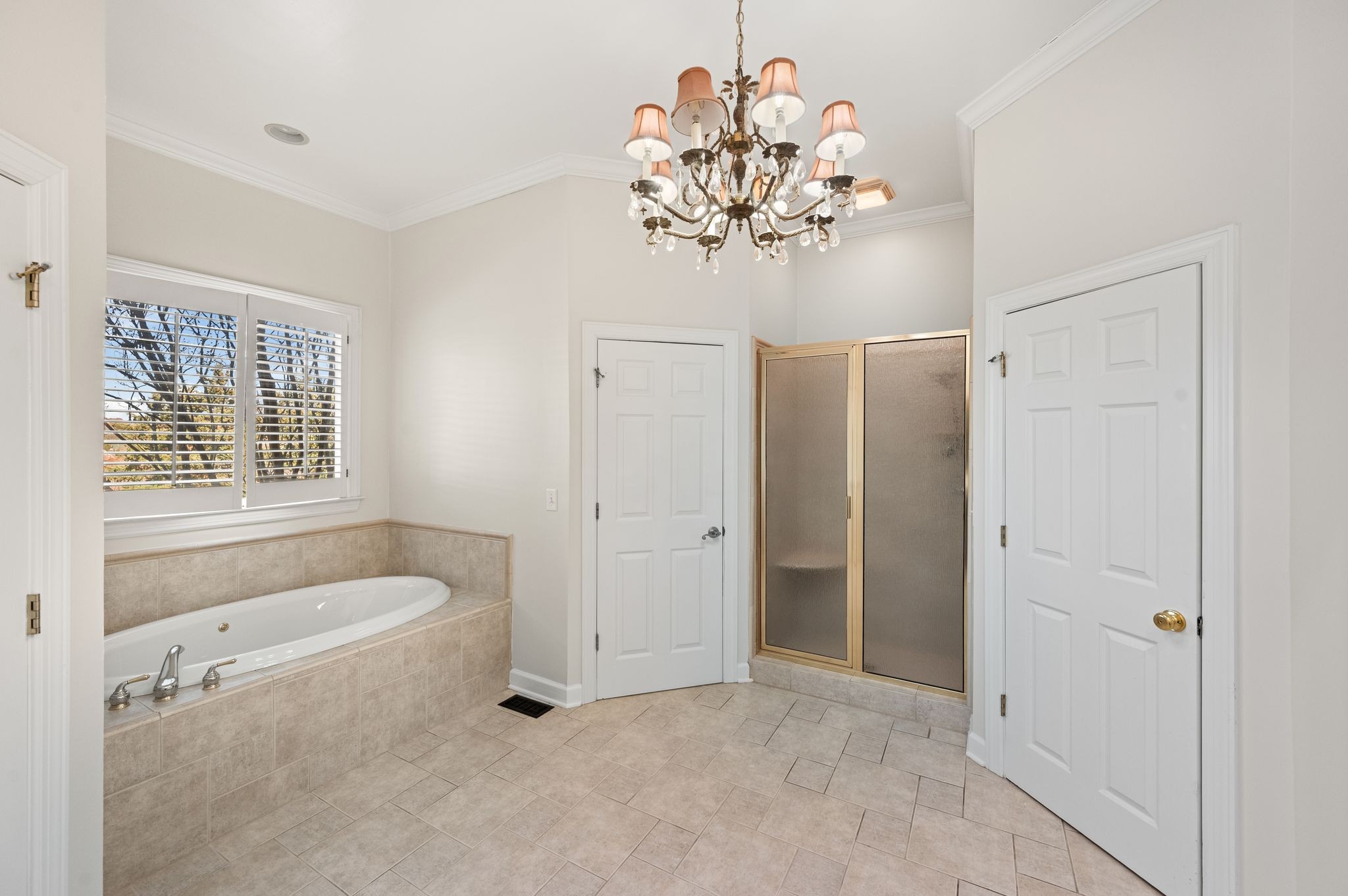 1060 Stonebridge Park Drive Franklin, TN 37069 - Photo 26 of 51 a bathroom with a granite countertop sink a large mirror and a bathtub