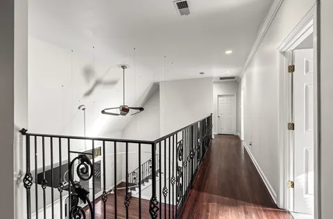 a view of entryway with wooden floor