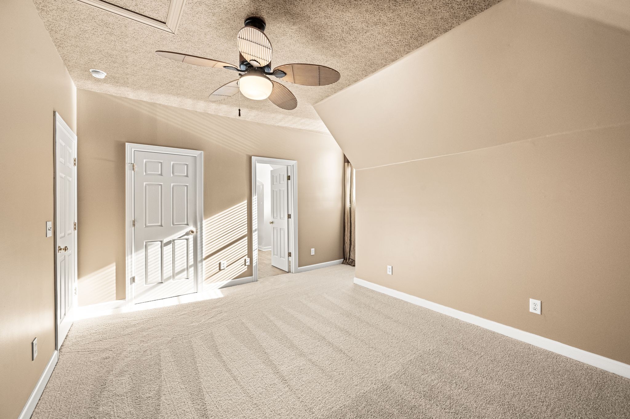 1060 Stonebridge Park Drive Franklin, TN 37069 - Photo 37 of 51 a view of an empty room with a ceiling fan