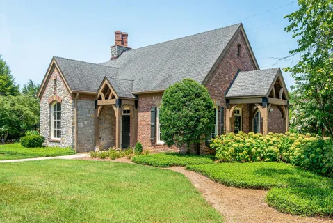 a view of a water fountain in the garden