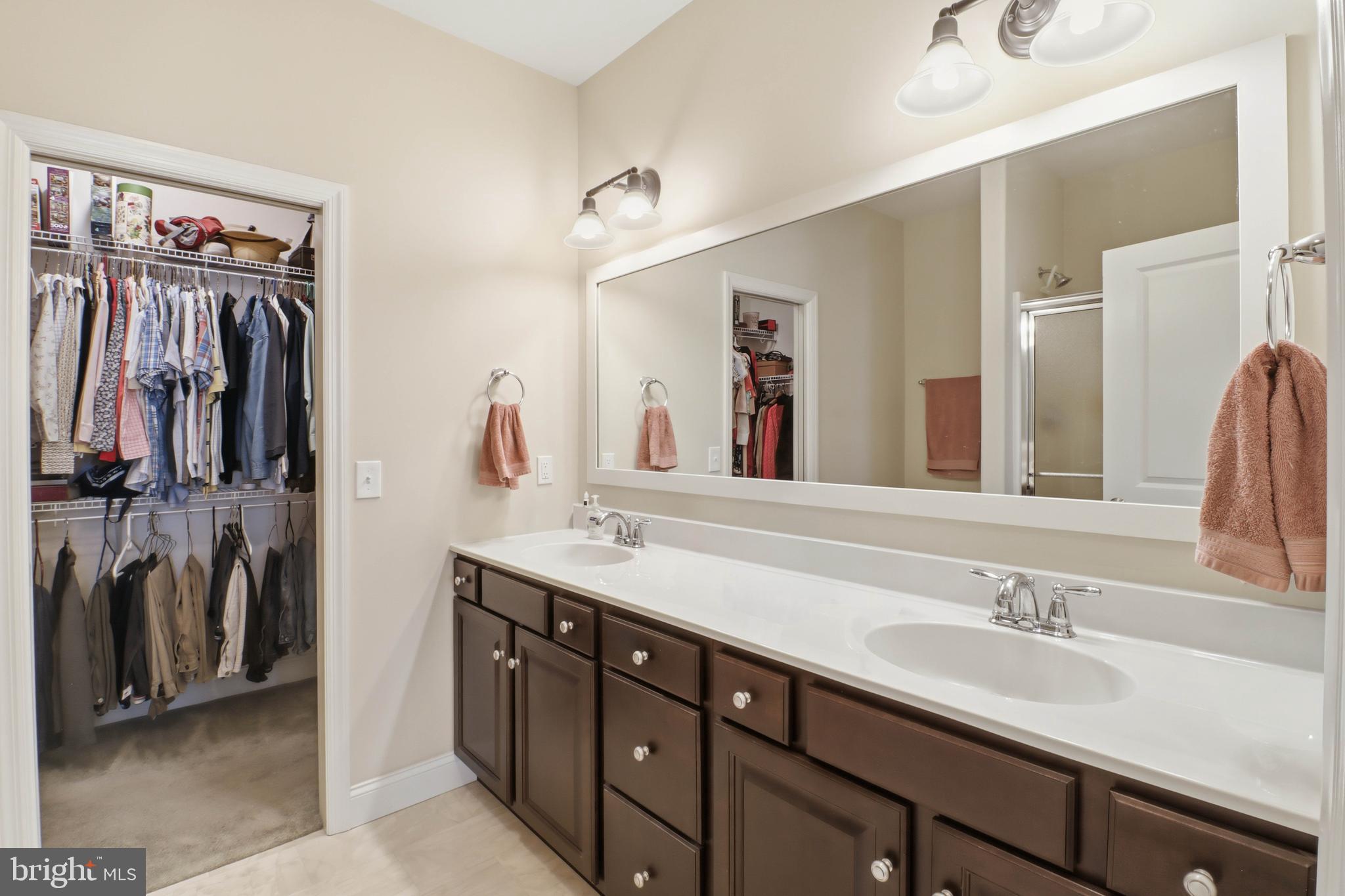637 Lititz Reserve Lane Lititz, PA 17543 - Photo 13 of 31 a bathroom with a double vanity sink and a mirror