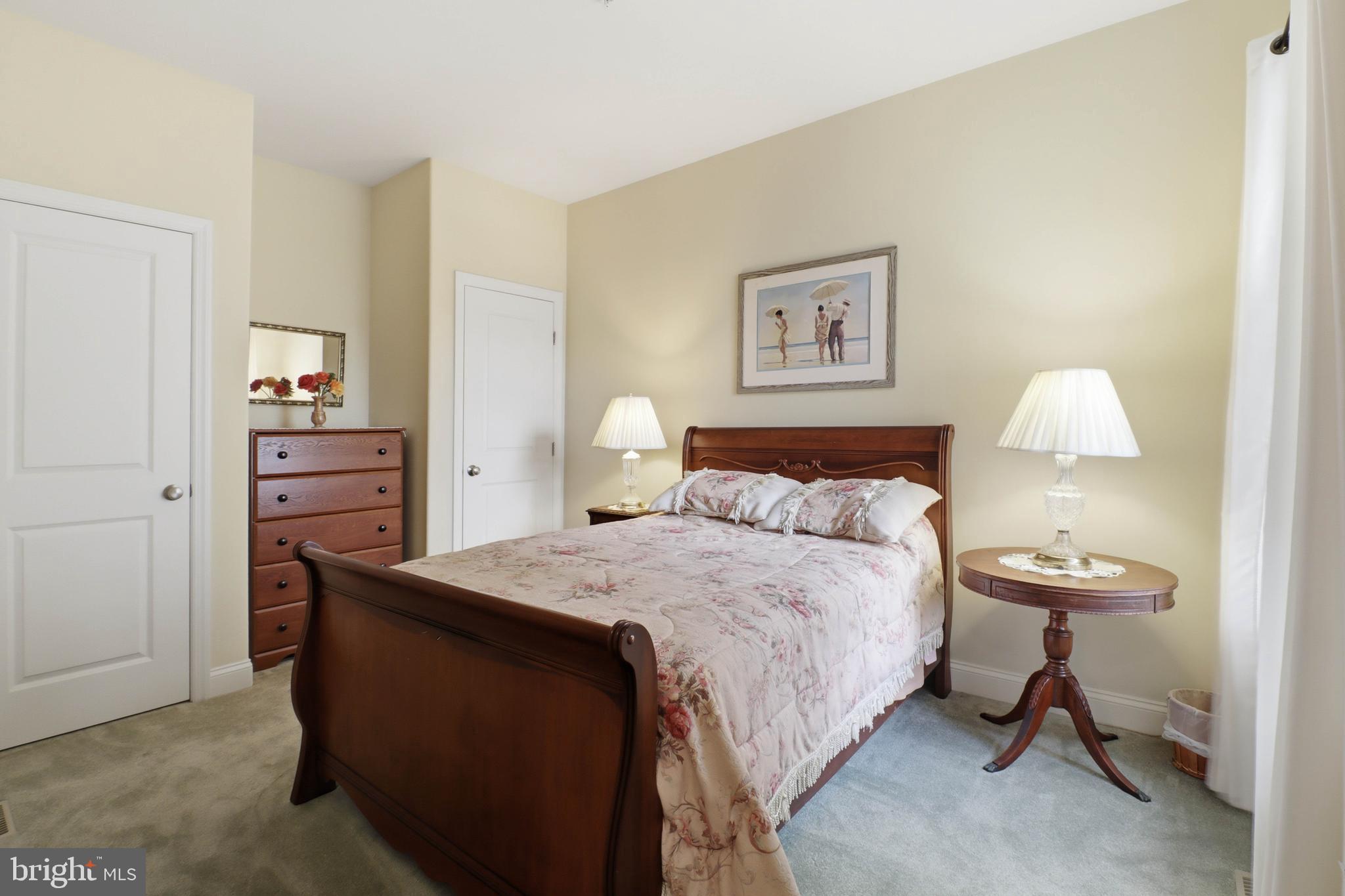 637 Lititz Reserve Lane Lititz, PA 17543 - Photo 15 of 31 a bedroom with a bed and a lamp on table