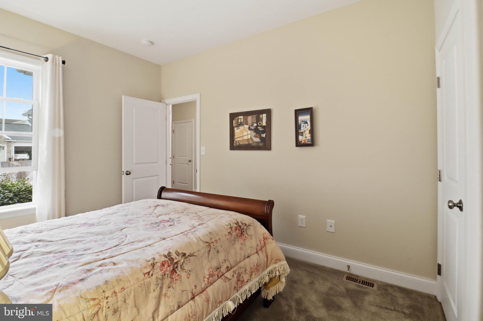 637 Lititz Reserve Lane Lititz, PA 17543 - Photo 18 of 31 a bedroom with a bed and a window