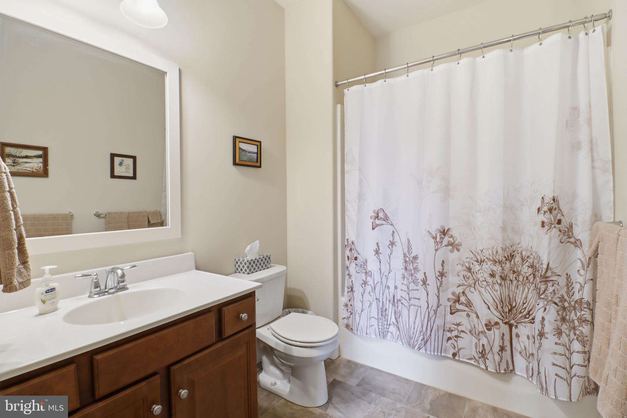 637 Lititz Reserve Lane Lititz, PA 17543 - Photo 19 of 31 a bathroom with a sink and a mirror