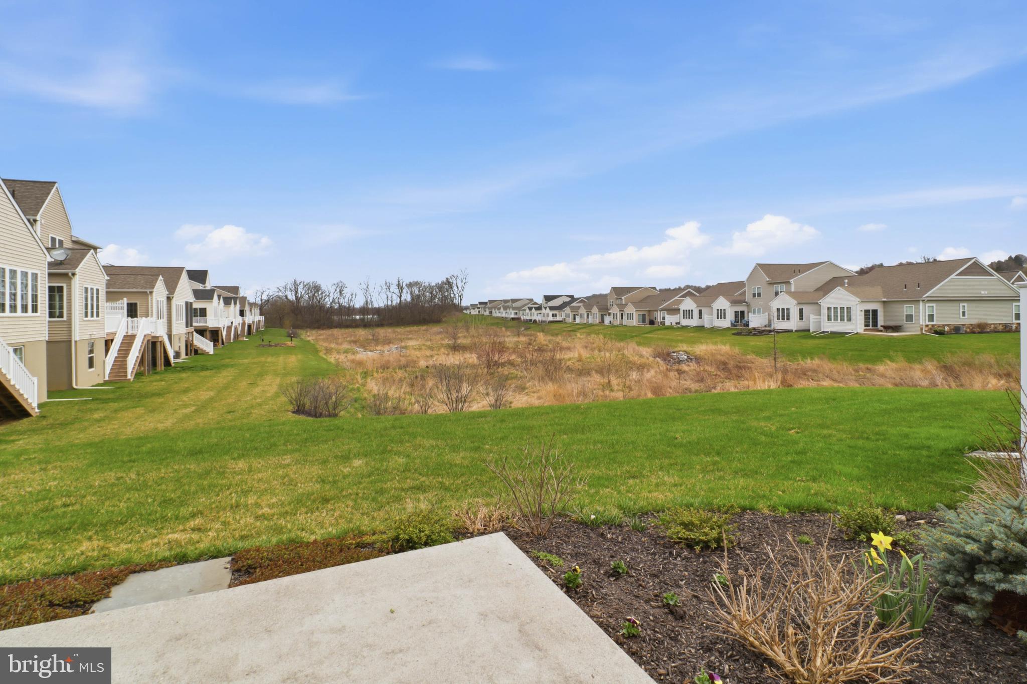 637 Lititz Reserve Lane Lititz, PA 17543 - Photo 21 of 31 a view of a lake with houses in the background