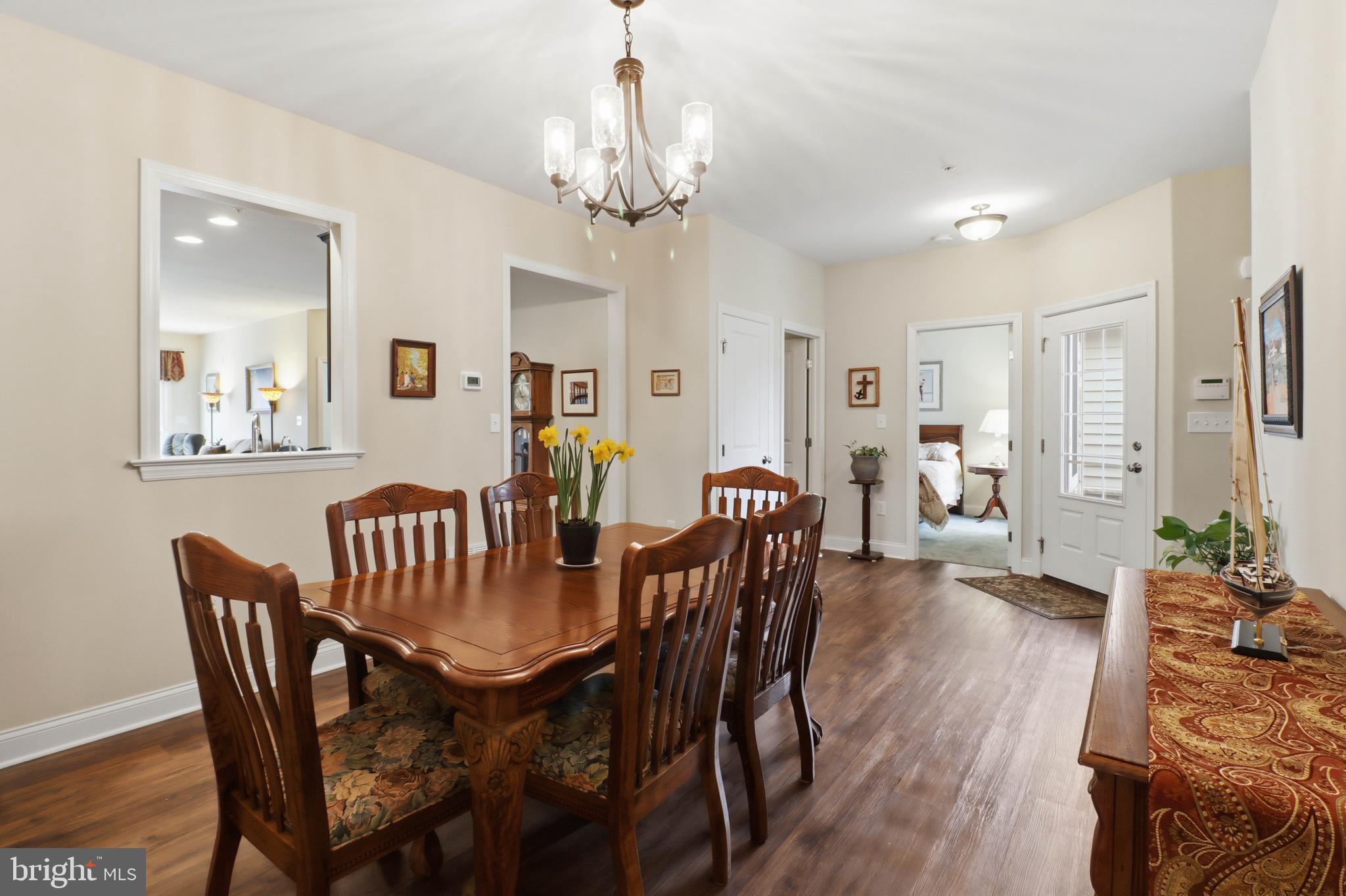 637 Lititz Reserve Lane Lititz, PA 17543 - Photo 9 of 31 a view of a dining room with furniture wooden floor and chandelier