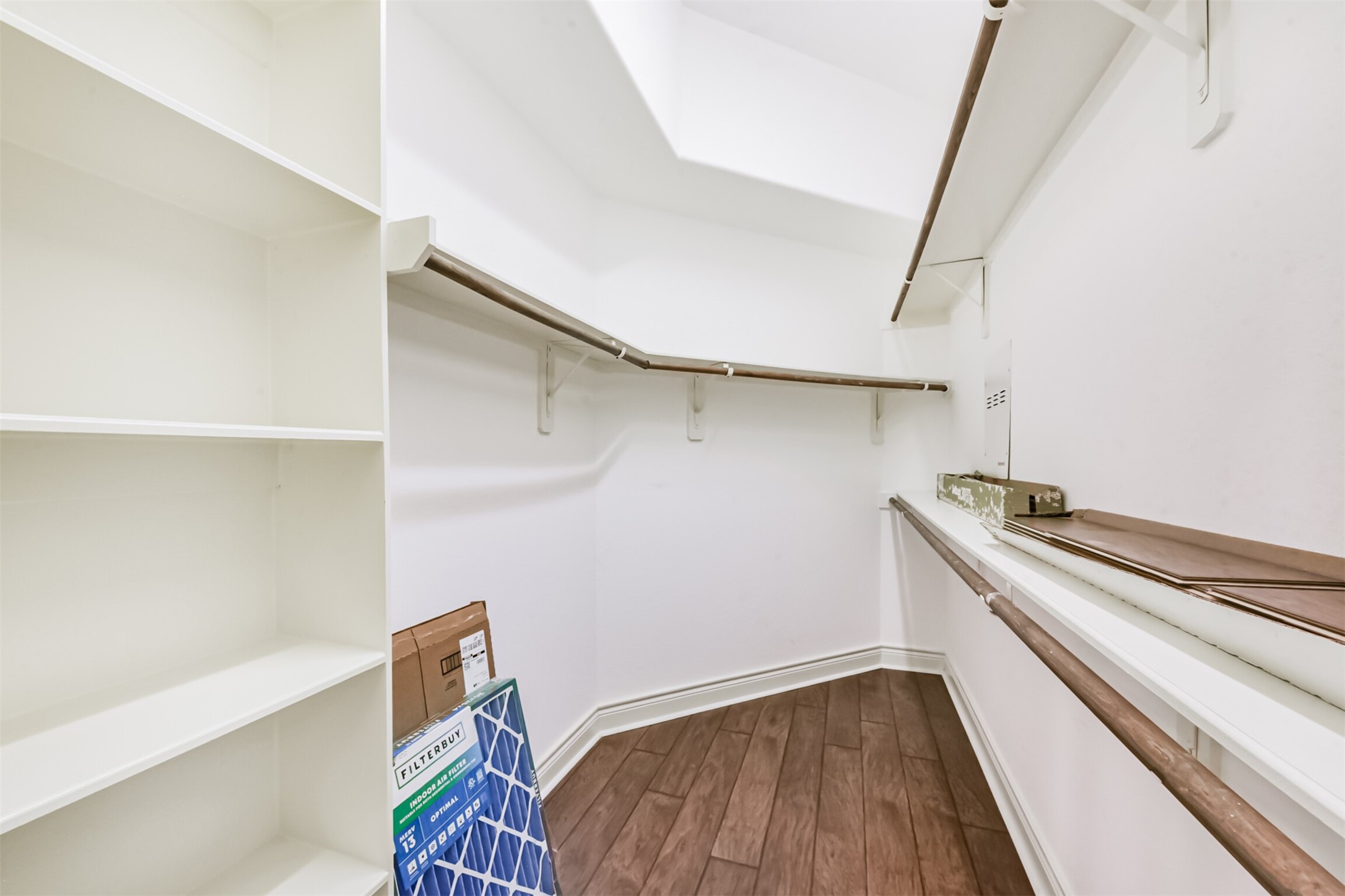 1065 Brigid Court Dickinson, TX 77539 - Photo 24 of 37 a kitchen with a stove and a wooden floor