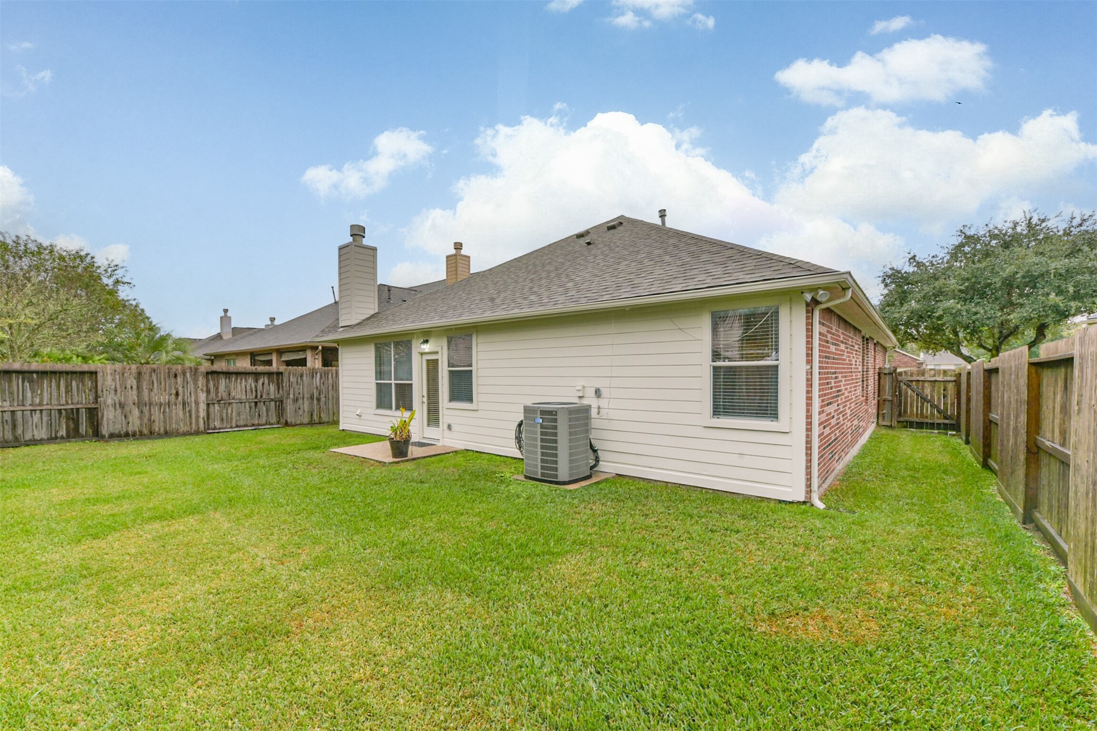 1065 Brigid Court Dickinson, TX 77539 - Photo 35 of 37 a view of a house with backyard