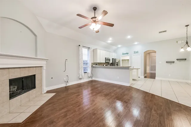 a view of a livingroom with a kitchen