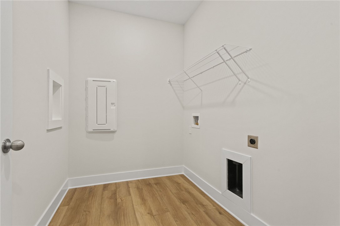 315 Old Shirley Road Central, SC 29630 - Photo 11 of 26 This dedicated space offers practical laundry solutions with durable flooring and ample ventilation.