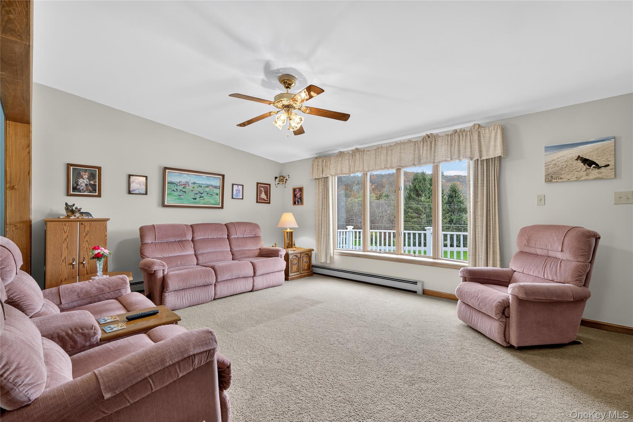 812 Obernberg Road North Branch, NY 12766 - Photo 11 of 43 a living room with furniture and a large window