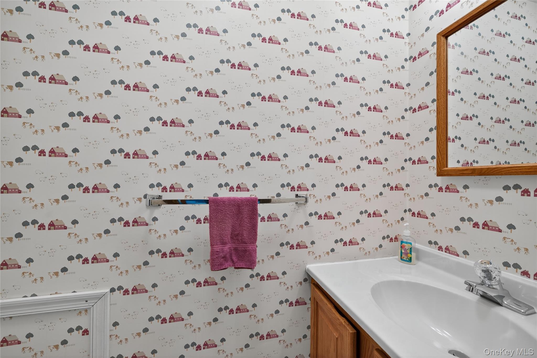 812 Obernberg Road North Branch, NY 12766 - Photo 24 of 43 a bathroom with a sink a vanity and a shower curtain