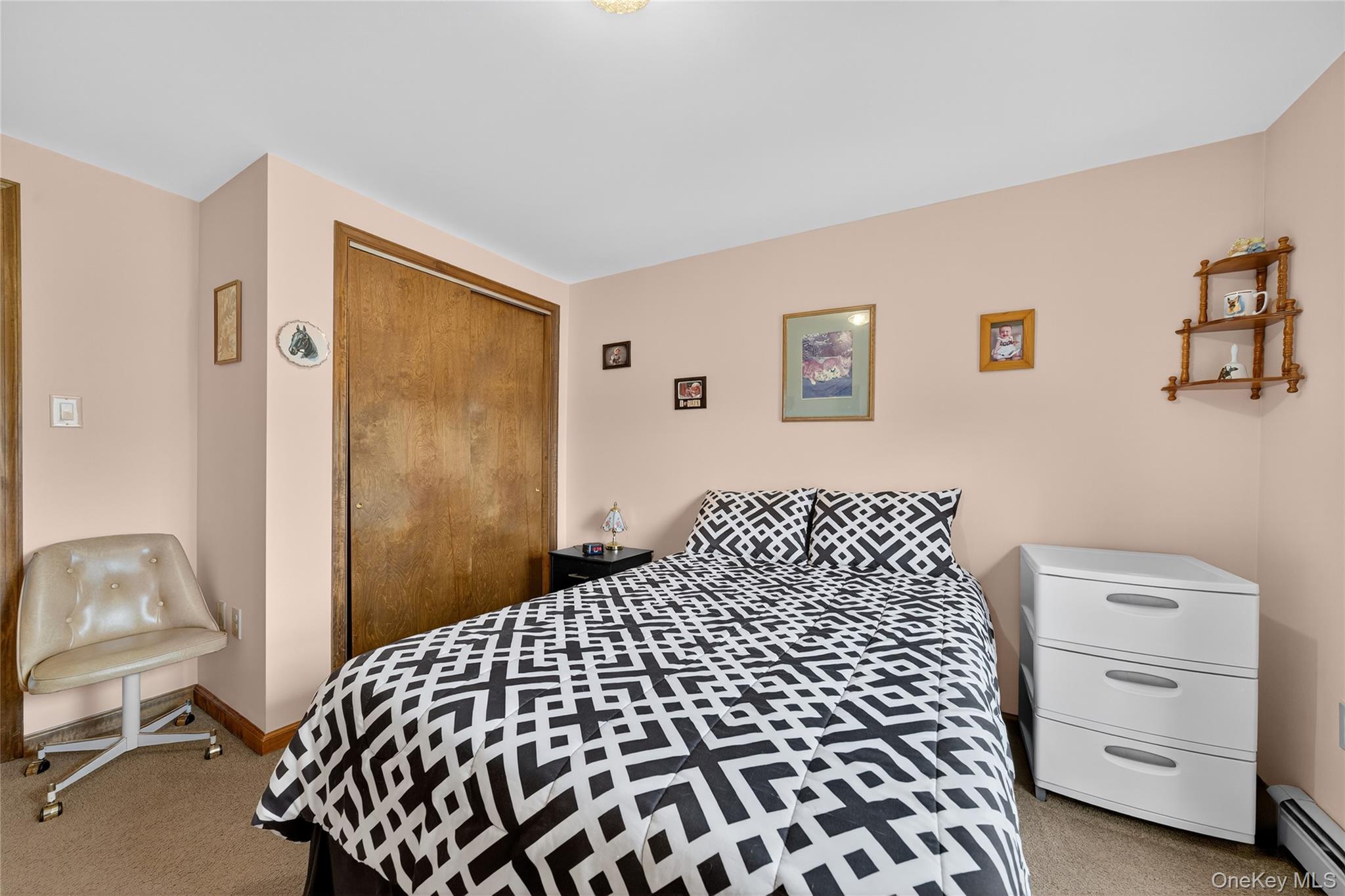 812 Obernberg Road North Branch, NY 12766 - Photo 28 of 43 a bedroom with a bed and a cabinets