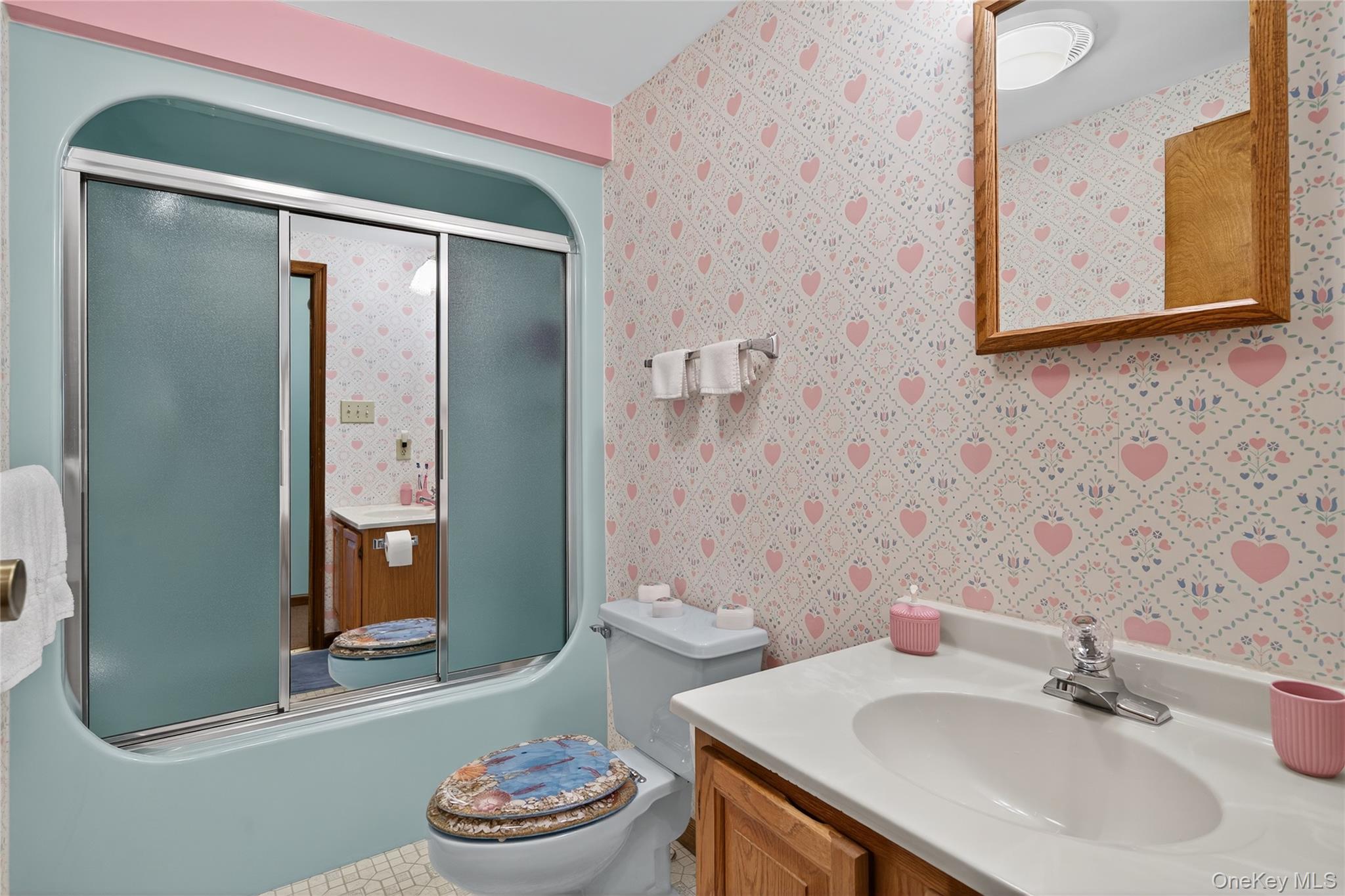 812 Obernberg Road North Branch, NY 12766 - Photo 29 of 43 a bathroom with a sink and a mirror