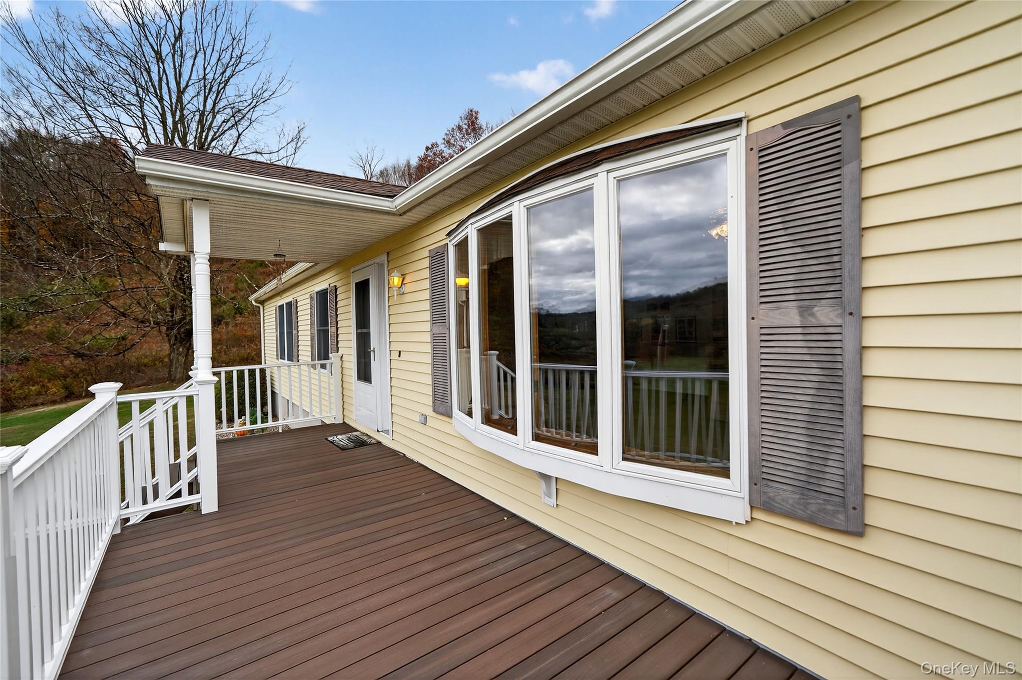 812 Obernberg Road North Branch, NY 12766 - Photo 8 of 43 a view of a house with wooden deck