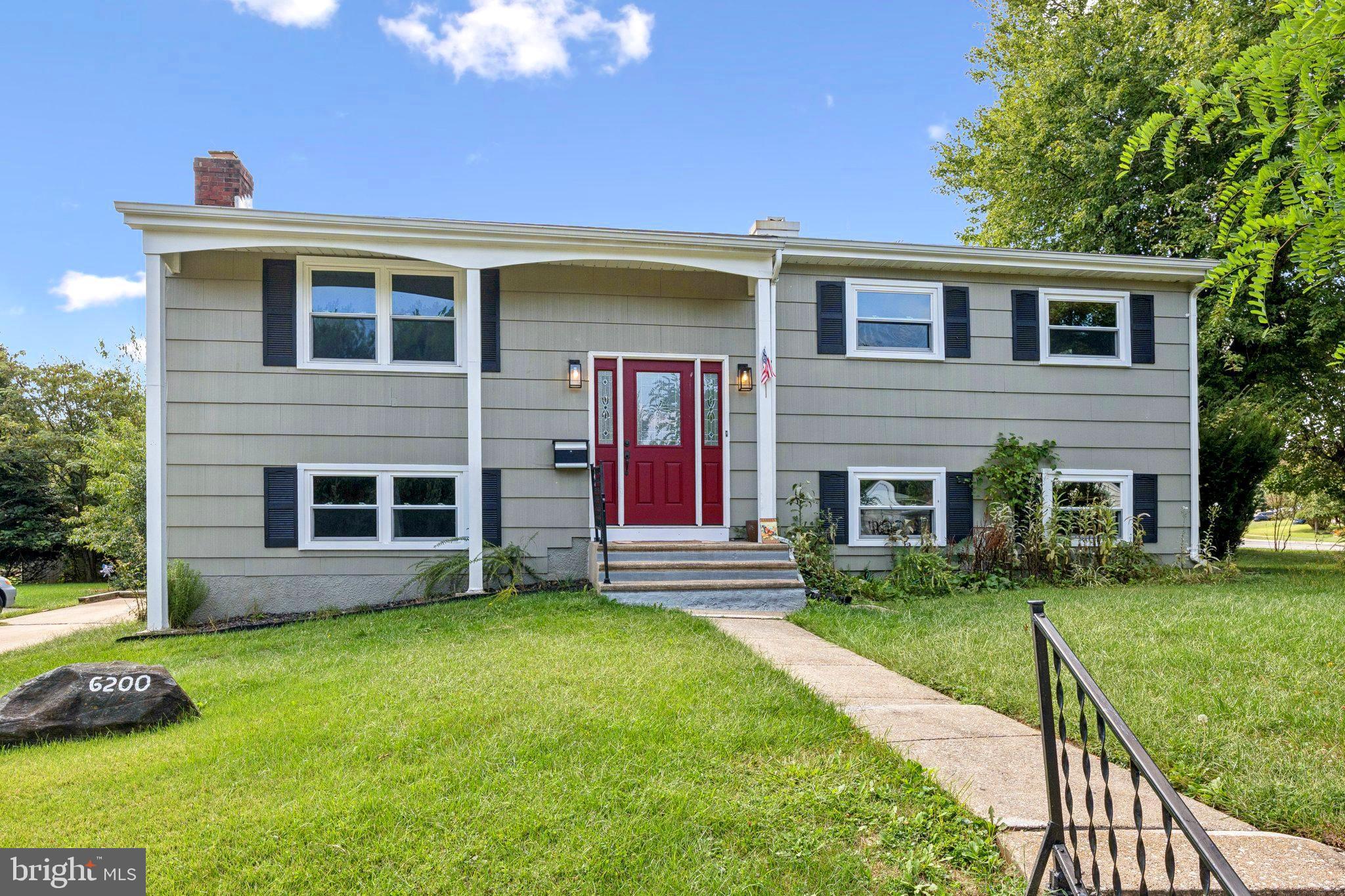 6200 Gilston Park Road Catonsville, MD 21228 - Photo 2 of 34 a front view of house with yard and green space