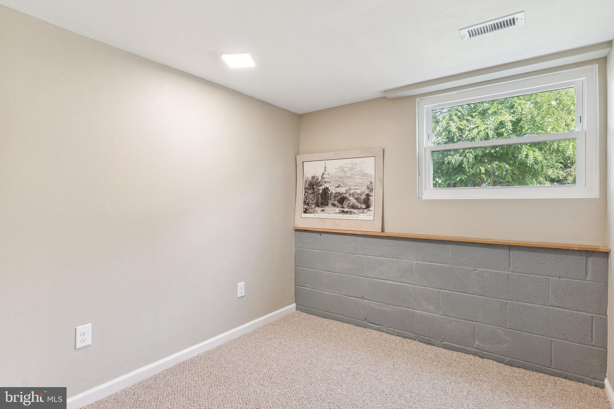6200 Gilston Park Road Catonsville, MD 21228 - Photo 23 of 34 a view of an empty room with a window