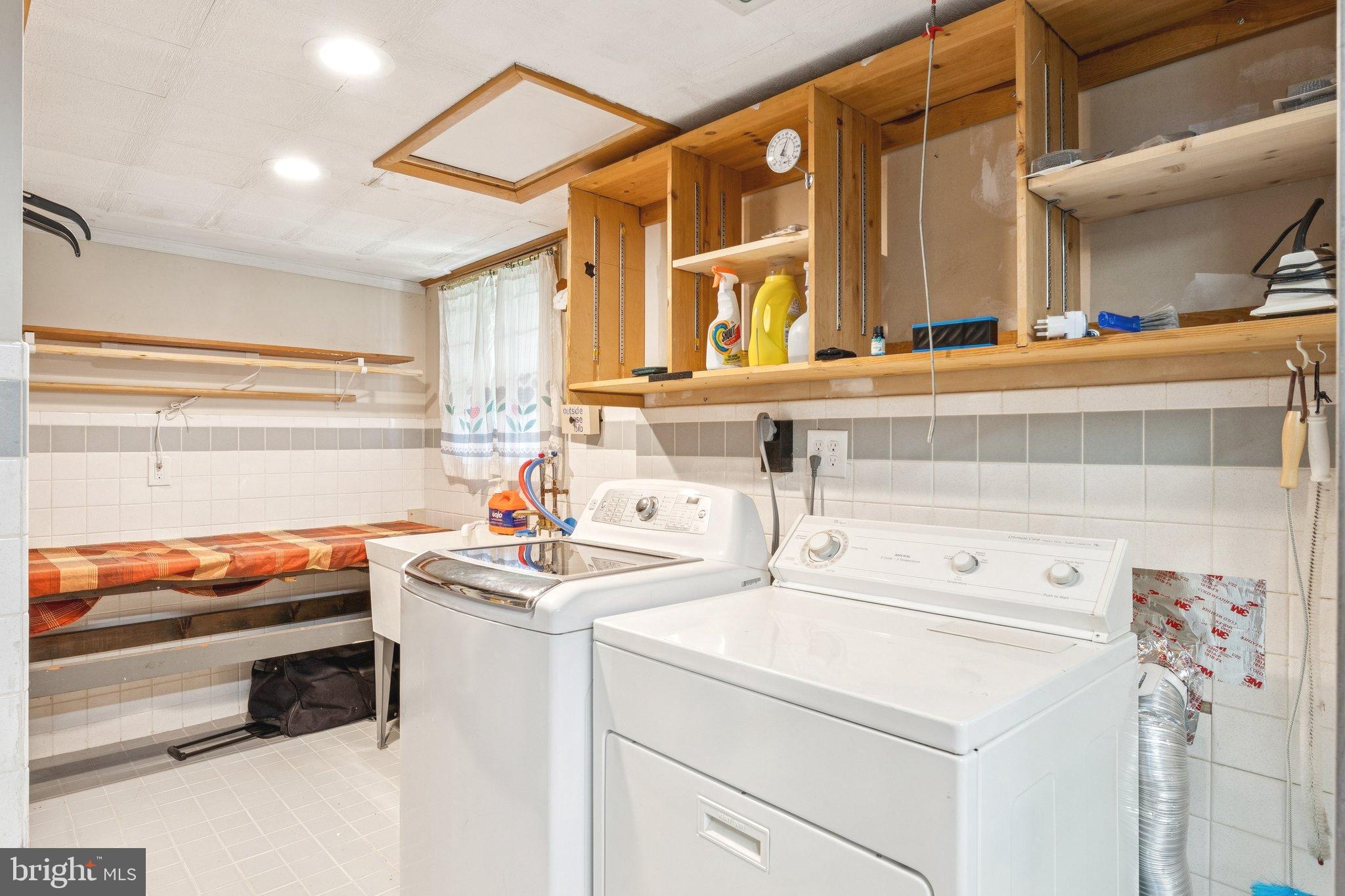 6200 Gilston Park Road Catonsville, MD 21228 - Photo 24 of 34 a utility room with dryer and washer