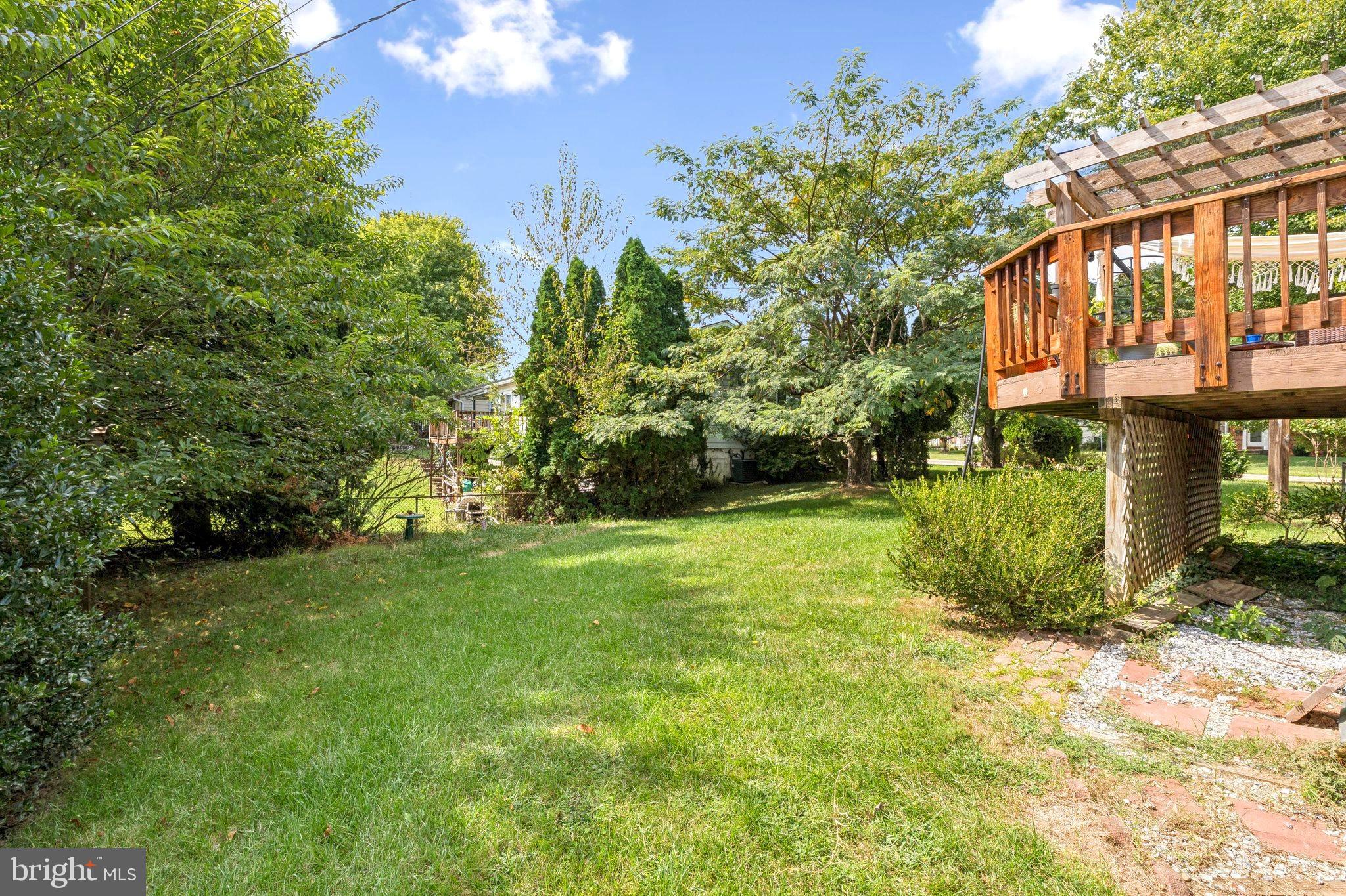 6200 Gilston Park Road Catonsville, MD 21228 - Photo 32 of 34 a view of a house with a yard
