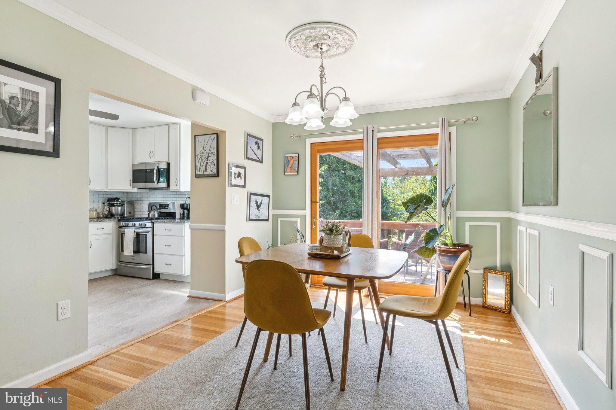 6200 Gilston Park Road Catonsville, MD 21228 - Photo 8 of 34 a view of a dining room with furniture window and outside view
