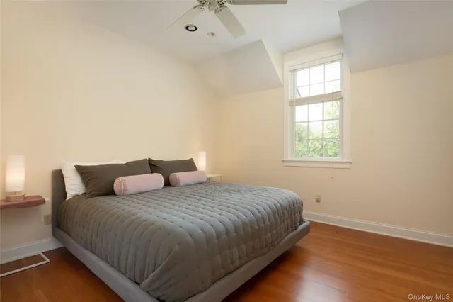 a kitchen with stainless steel appliances granite countertop a refrigerator a stove top oven a sink and dishwasher next to a window