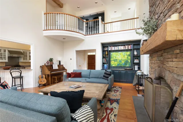 a balcony with furniture and garden view