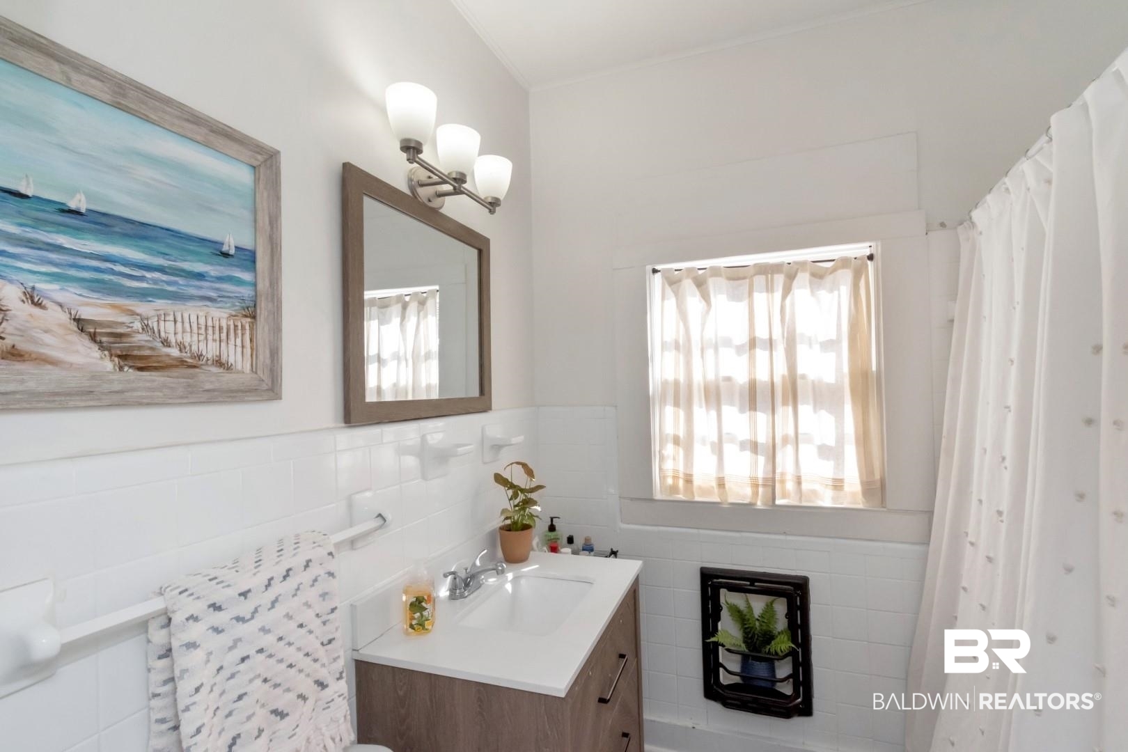 116 Item Avenue Mobile, AL 36607 - Photo 23 of 33 Bathroom with vanity and tile walls