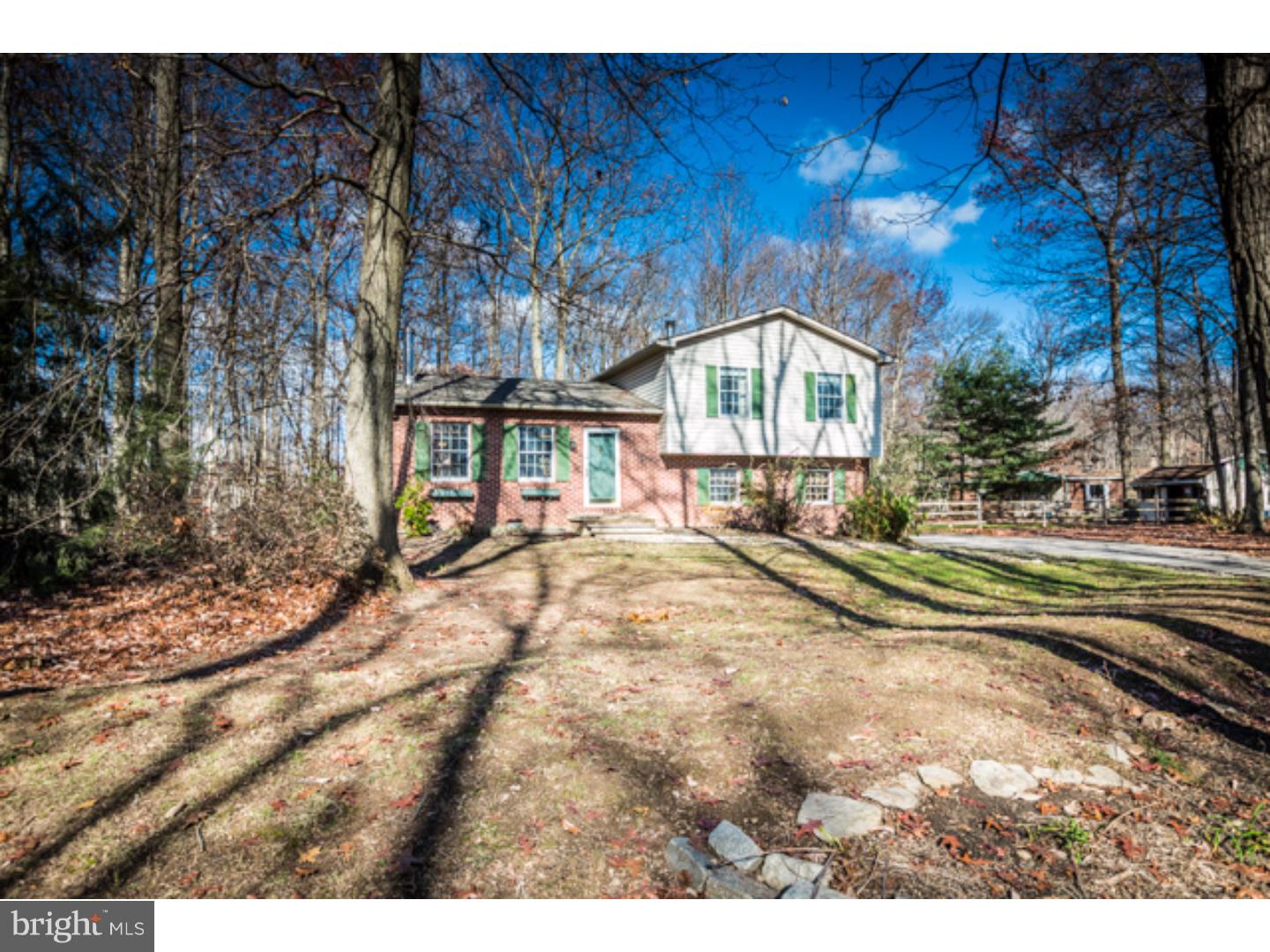 232 Cambridge Road Coatesville, PA 19320 - Photo 1 of 25 a view of a house with a yard